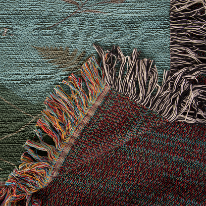 Close-up of woven texture and butterfly artwork on daughter blanke