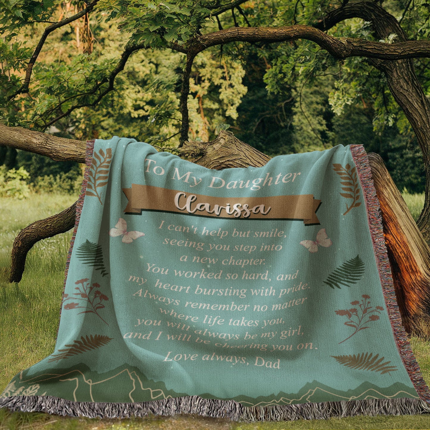 Personalized woven blanket for daughter with mountain and butterfly design symbolizing new beginnings.