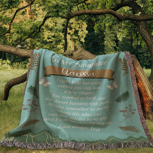 Personalized woven blanket for daughter with mountain and butterfly design symbolizing new beginnings.